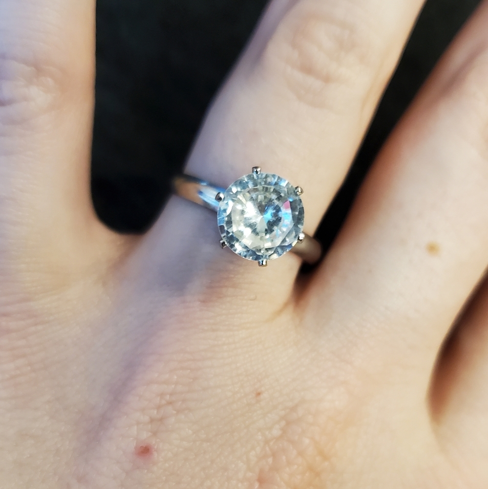 Silver-Toned Adjustable Ring.